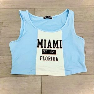 blue and white cropped tank top